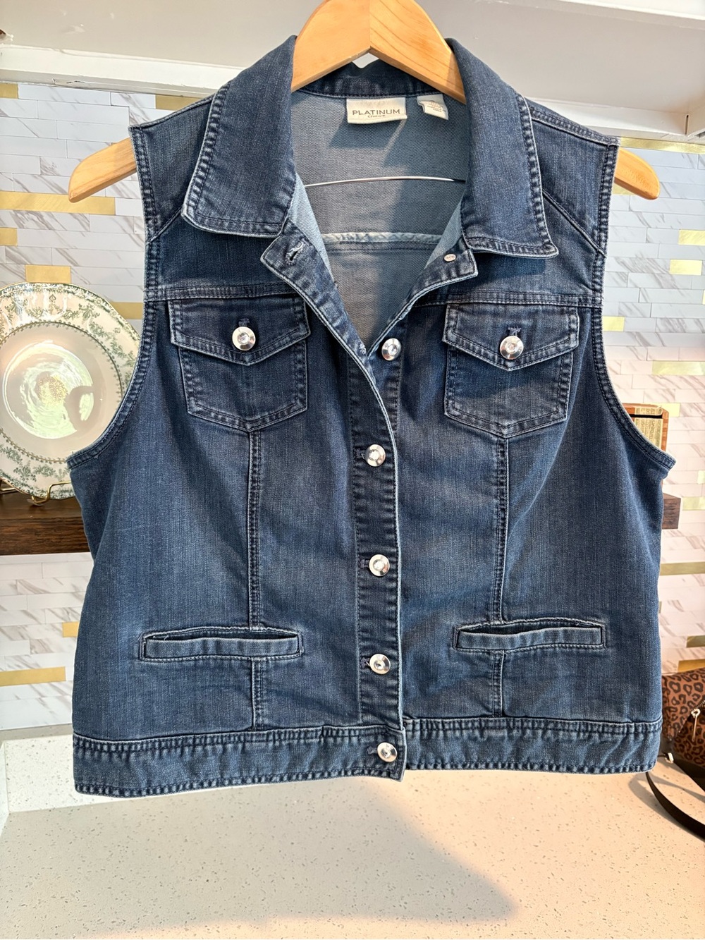 Chico's platinum, dark blue trucker vest.